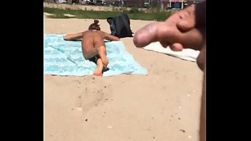 Play Nude beach masturbating on a naked girl